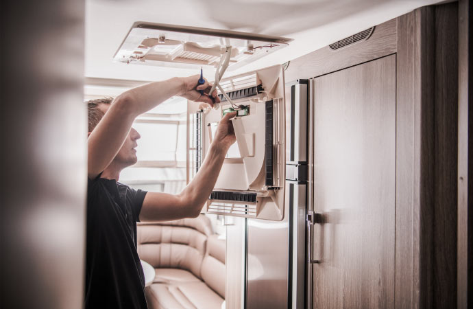 A man repairing heating services