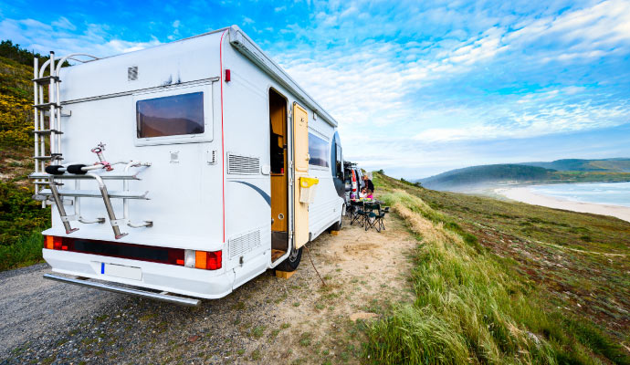 RV parked near a scenic beach