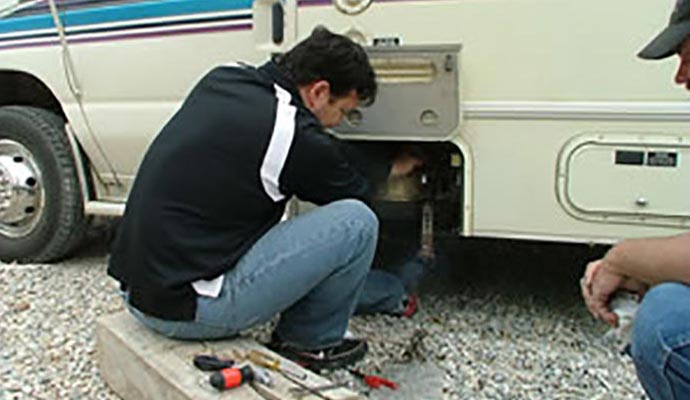 technician working on RV repairs