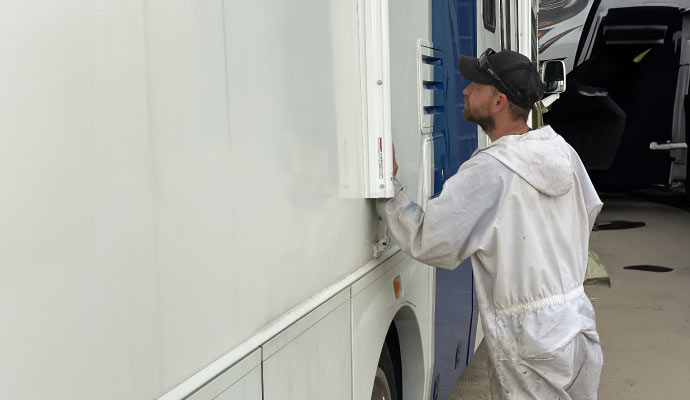 expert repairing rv body