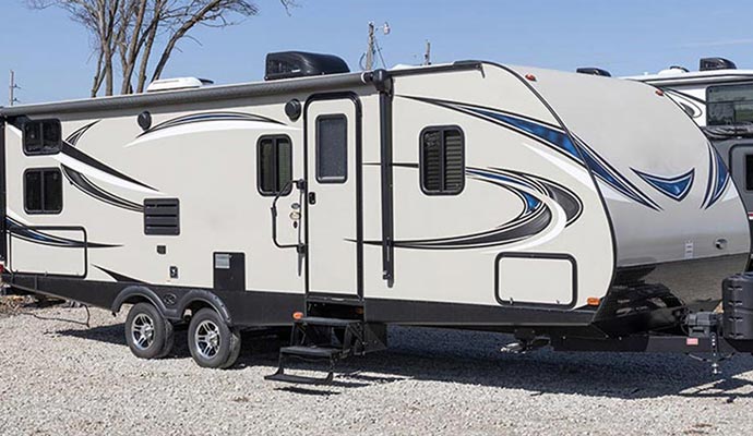 a parked rv trailer ready for an adventure